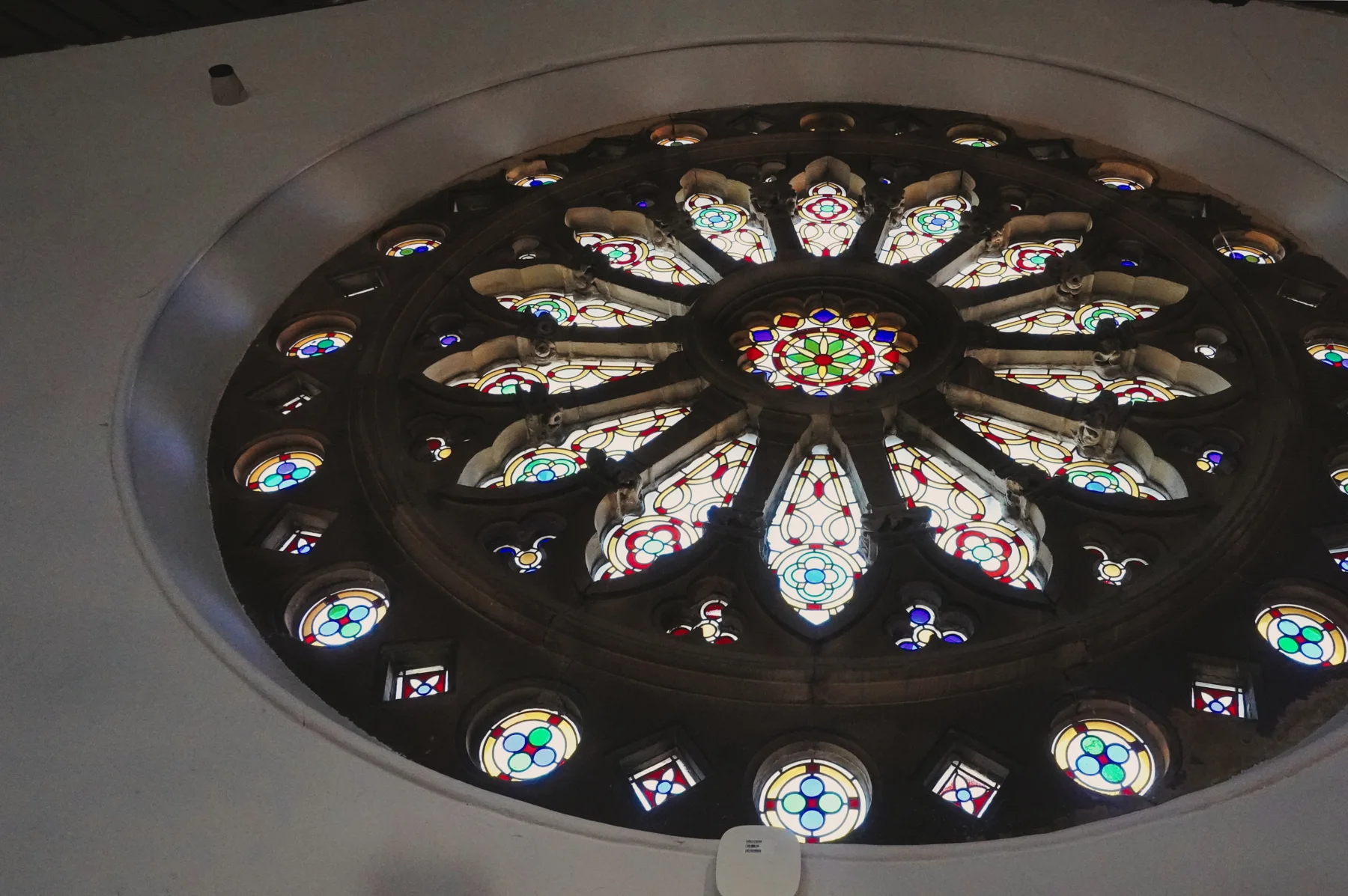 The circular stained-glass rose window
