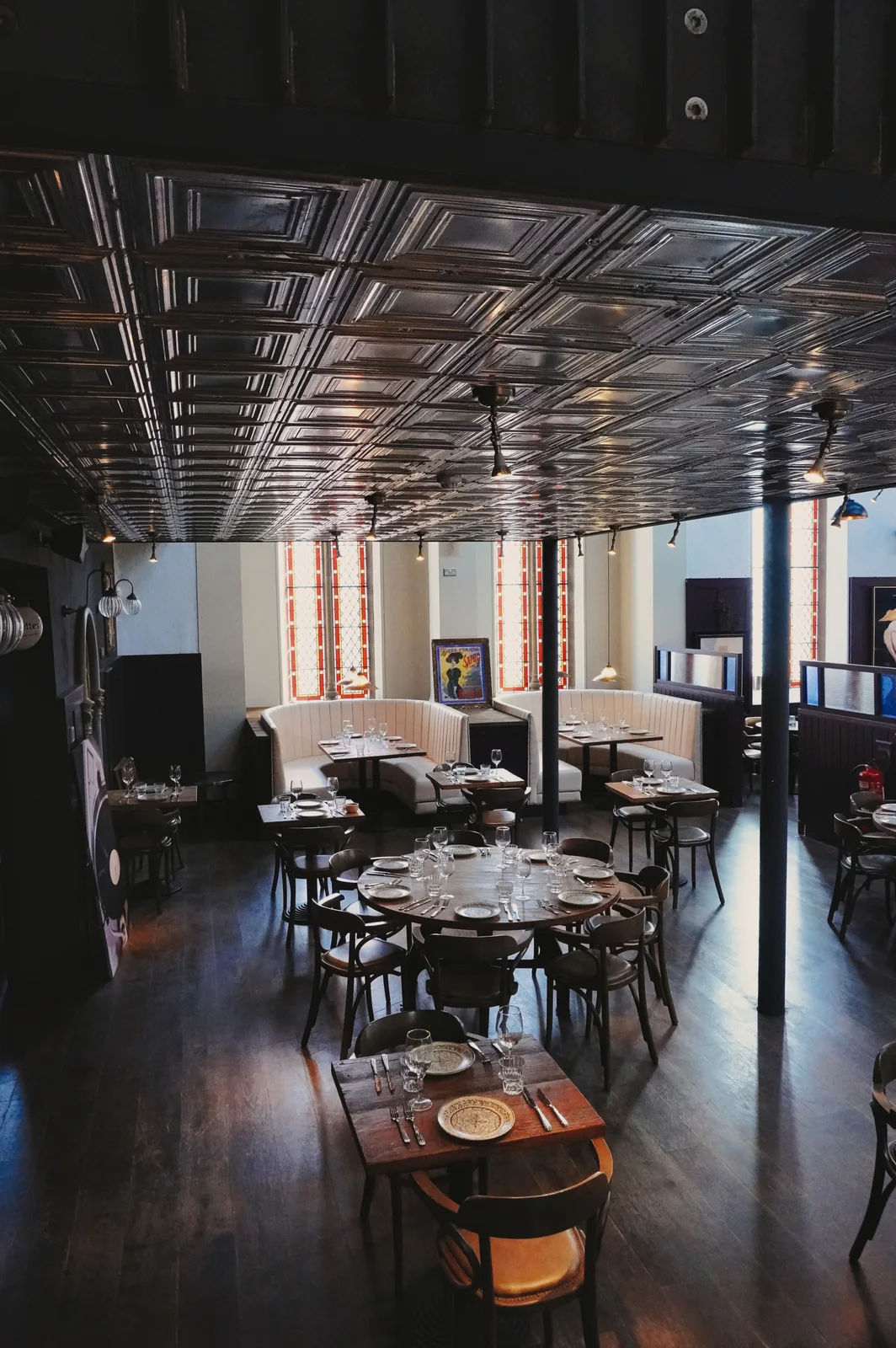 A glimpse of dining tables through the interior