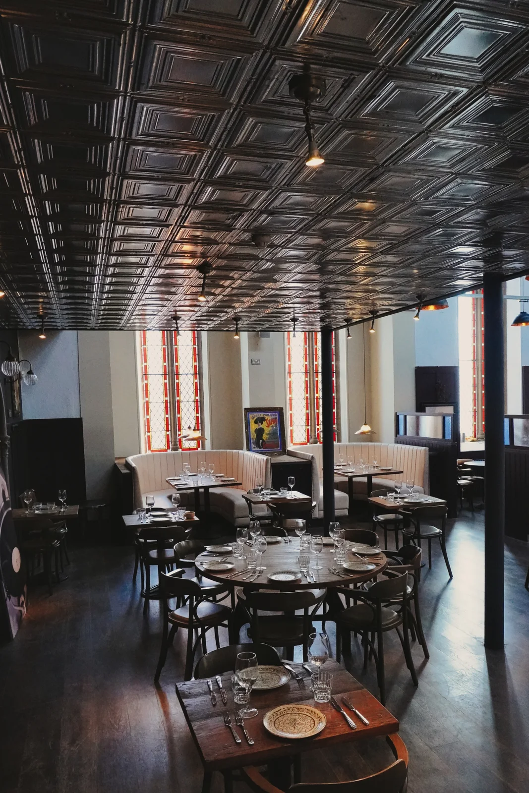 A glimpse of dining tables through the interior